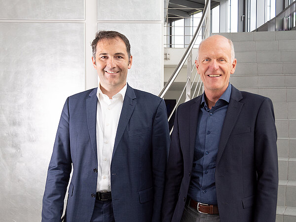 Markus Wimplinger, corporate technology development and IP director at EV Group (left) and Robert Saller, managing director at DELO (right)